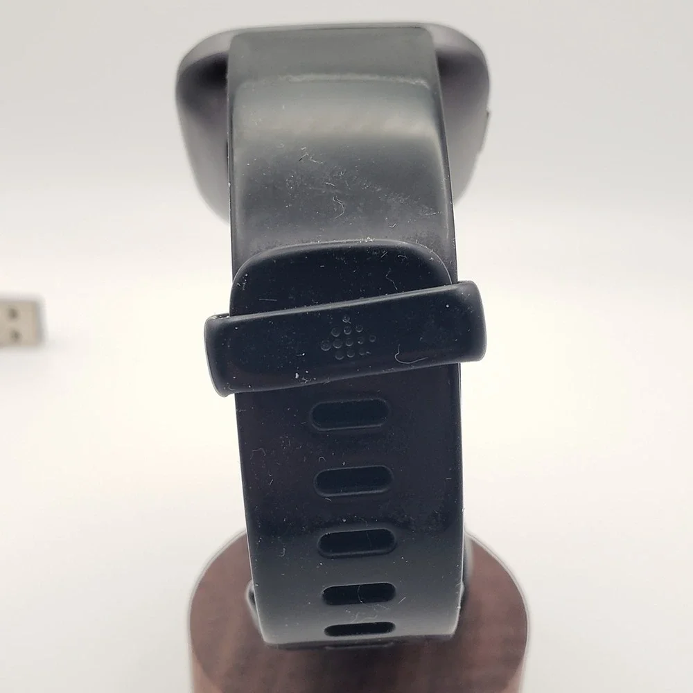 fitbit smartwatch featuring